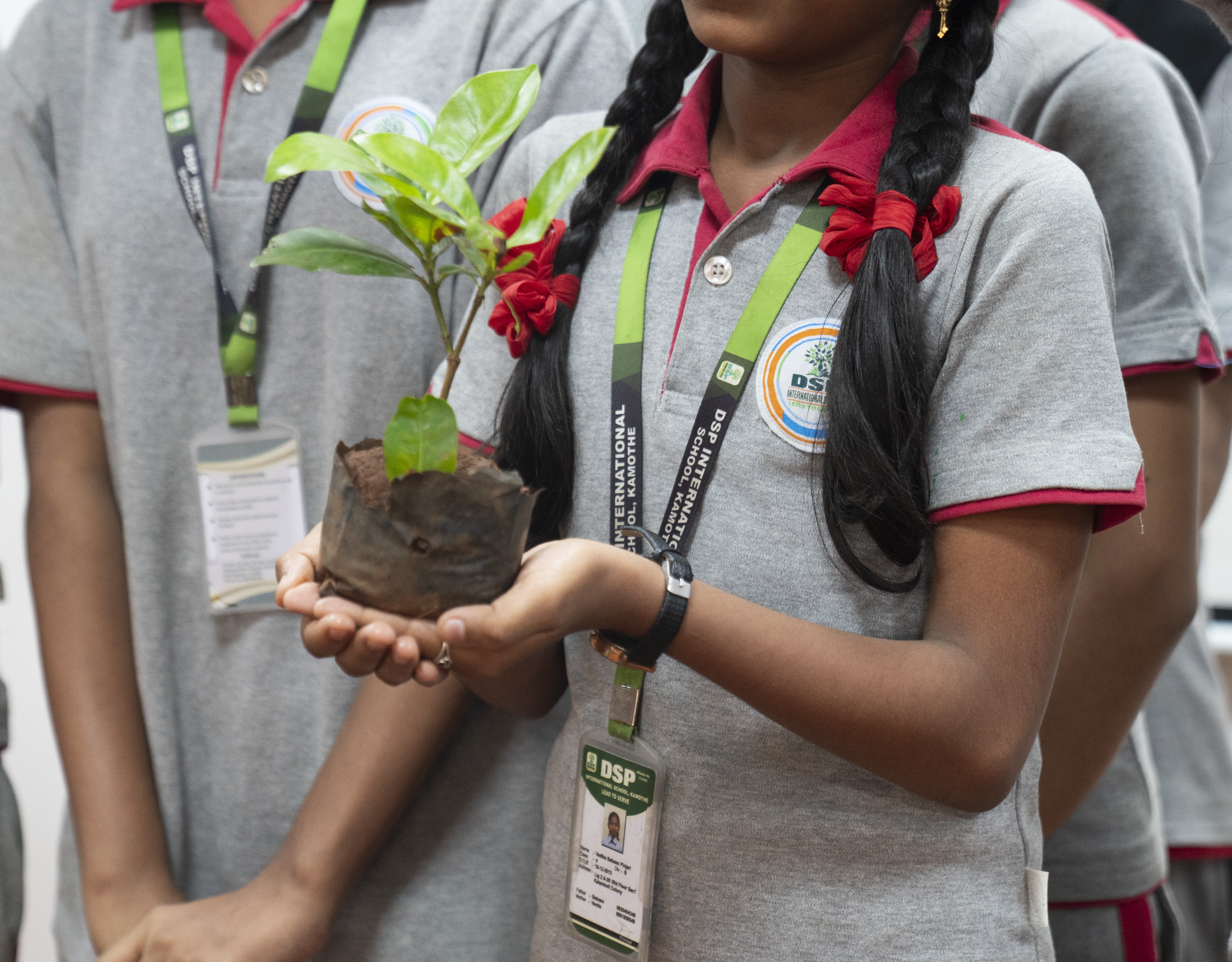 Earth Day - Students holding environmental awareness signs
